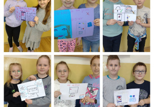 Uczniowie z plakatami w dloniach w Dniu Bezpiecznego Internetu